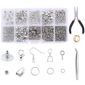Detailed DIY jewelry making kit with silver findings, pliers, and tweezers in storage box