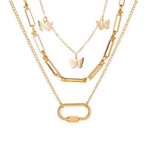 Chic multi-layered gold metal chain necklace with butterfly pendants and oval link accents