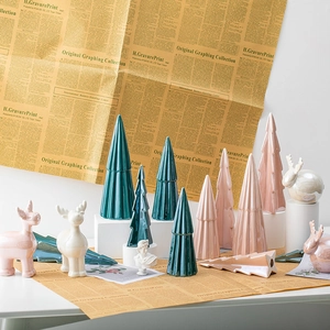Modern ceramic Christmas tree and reindeer figurines in Nordic Morandi pink and green