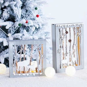 Wooden Christmas star lanterns with LED lights featuring reindeer and forest silhouettes