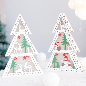 Wooden Christmas tree lantern with reindeer and snowman on cozy plush white background