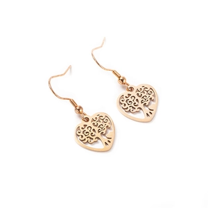 Rose gold heart-shaped earrings with tree of life cutouts on a white background