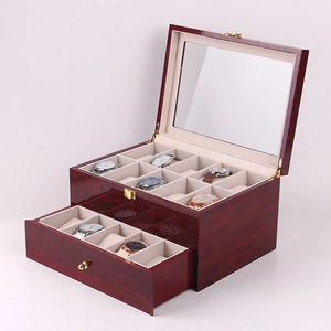 Detail of 20-slot double-layer wooden watch box with red glossy finish and glass lid
