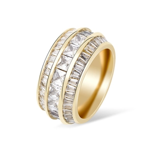 Macro detail of gold plated hip hop ring with triple row baguette cubic zirconia