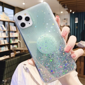 Detail of green glitter star phone case with integrated round folding socket stand