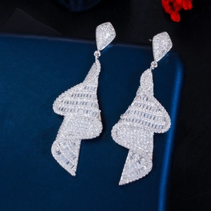 S925 silver needle geometric spiral earrings with sparkling cubic zirconia on jewelry box