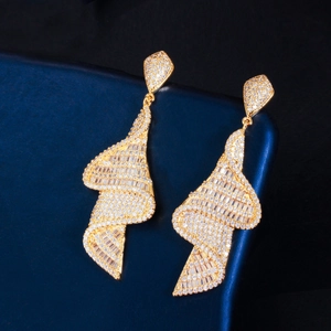 Elegant gold spiral drop earrings with shimmering micro-pave cubic zirconia crystals