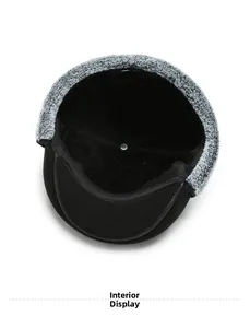 Lining detail showing thick black faux fur interior of the warm winter flat cap