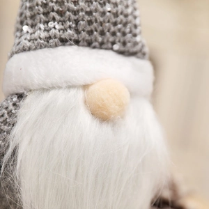 Close-up of a Nordic Christmas gnome featuring sequined grey hat and white faux fur beard