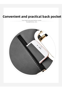 Detail of the back zipper pocket on the black leather bag showing storage for a smartphone