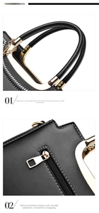 Detail of smooth black faux leather handle with white stitching and gold zipper hardware