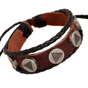 Detailed view of multilayer leather necklace with braided cords and metal charms