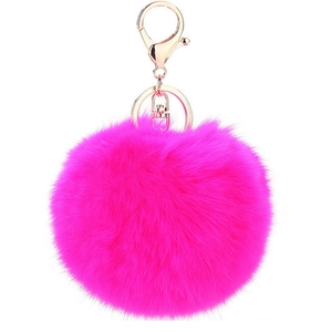 Close-up of rose pink faux fur pompom keychain with golden metal spring clasp and ring