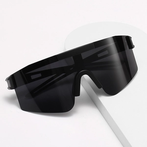 Polarized sports sunglasses with large black frame and matte wrap-around shield design