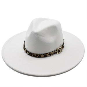 Detail of white wool wide brim fedora hat featuring a stylish leopard print band and gold buckle