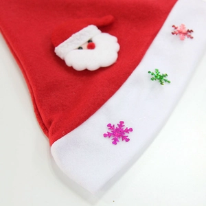 Plush red Christmas hat for kids with Santa Claus figurine and sparkling snowflake sequins