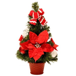 Mini albero di Natale da tavolo con fiori rossi e fiocco su sfondo bianco pulito