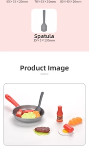 Macro shot of kids' toy spatula and frying pan set with simulated food accessories