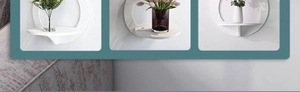 Three minimalist white round wall shelves with plants in a clean Nordic style layout