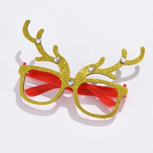 Detail of Christmas reindeer antler glasses with gold glitter finish and white rhinestones