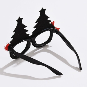 Detail of Christmas tree glasses with felt finish and red pom-poms on a white background