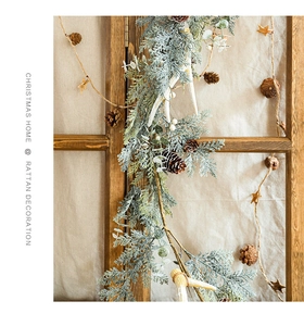 Christmas rattan decoration featuring frosted pine needles, pine cones and antlers decor