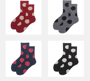 Detailed grid view of four pairs of cotton polka dot socks in multiple color variants