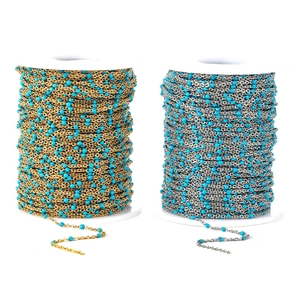 Detail of DIY stainless steel chains with turquoise enamel beads in gold and silver finish