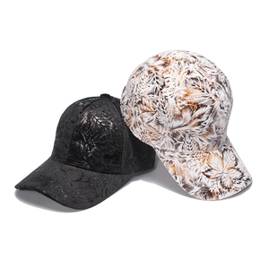 Detail of cotton baseball caps with unique textured vein patterns in black and white