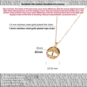 Detail showing colorful zircon tree of life pendant and 1.6mm gold link chain