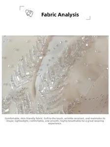 Détail du tissu de robe mariée champagne avec paillettes étincelantes et broderies