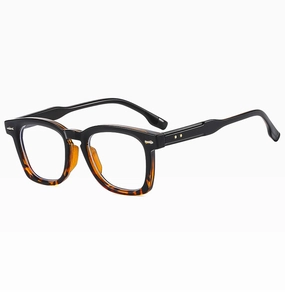 Detail of black and tortoiseshell frames with a gold star metal accent on sunglasses