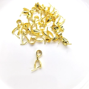 Detailed close-up of 14k gold-filled S925 sterling silver pinch bails for DIY jewelry making