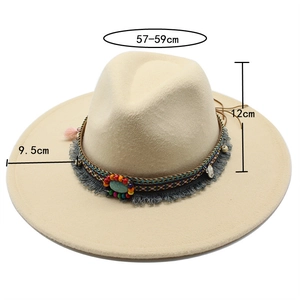 Detail showing 9.5cm wide brim and ethnic style beaded band on beige wool jazz hat