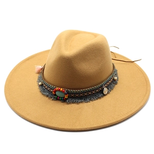 Detail view of khaki wool fedora featuring colorful beaded band and grey fringe trim