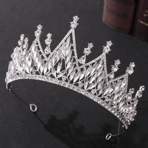 Baroque bridal tiara with white crystals and silver finish for wedding hairstyle