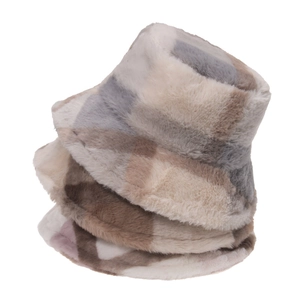 Detailed view of colorful plush plaid bucket hats in soft faux fur for winter warmth