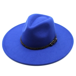 Close-up of royal blue wool fedora hat with 9.5cm wide brim and leopard print belt