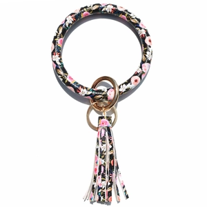 Sleutelhanger armband van leer met bloemenprint, kwastje en gouden metalen ring