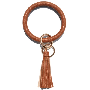 Brown litchi grain leather wristlet keychain with gold hardware and tassel detail