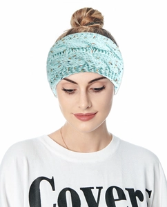 Detail of light blue cable knit headband with colorful flecks and soft texture