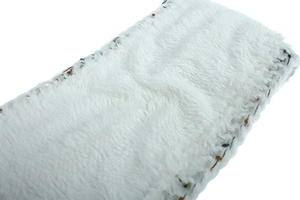 Close-up of white plush lining and knitted edge detail on winter thermal headband