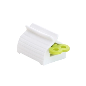 Manual rolling tube squeezer for toothpaste and creams in white and green finish