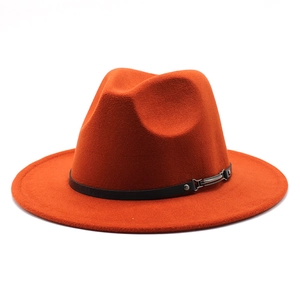 Detail of orange wool fedora hat featuring black faux leather band and silver metal buckle
