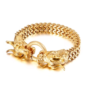 Gold double dragon head woven bracelet in polished stainless steel for men