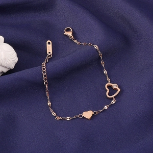 Elegant rose gold titanium steel heart bracelet featuring K18 engraved charm and dual hearts