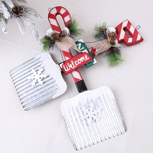 Christmas welcome door hanger with metal snow shovel, candy cane and pine cone decor