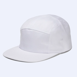 Close-up of white 5-panel cotton camper hat featuring flat brim and premium stitching
