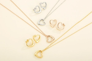 Three-color hollow heart-shaped stainless steel necklace and earrings jewelry set