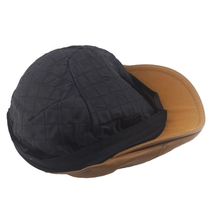 Brown leather newsboy cap featuring a warm black quilted lining for winter insulation